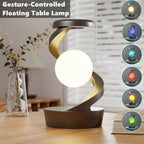 Floating wireless charging atmosphere lamp with warm white glowing orb, dark gray base