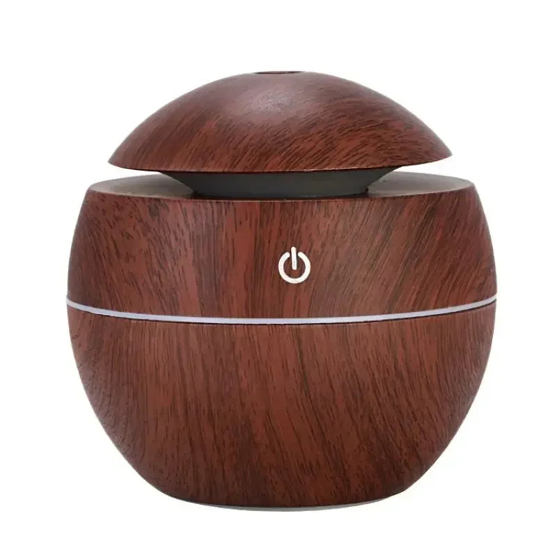 Dark wood grain air humidifier with domed lid and glowing power button
