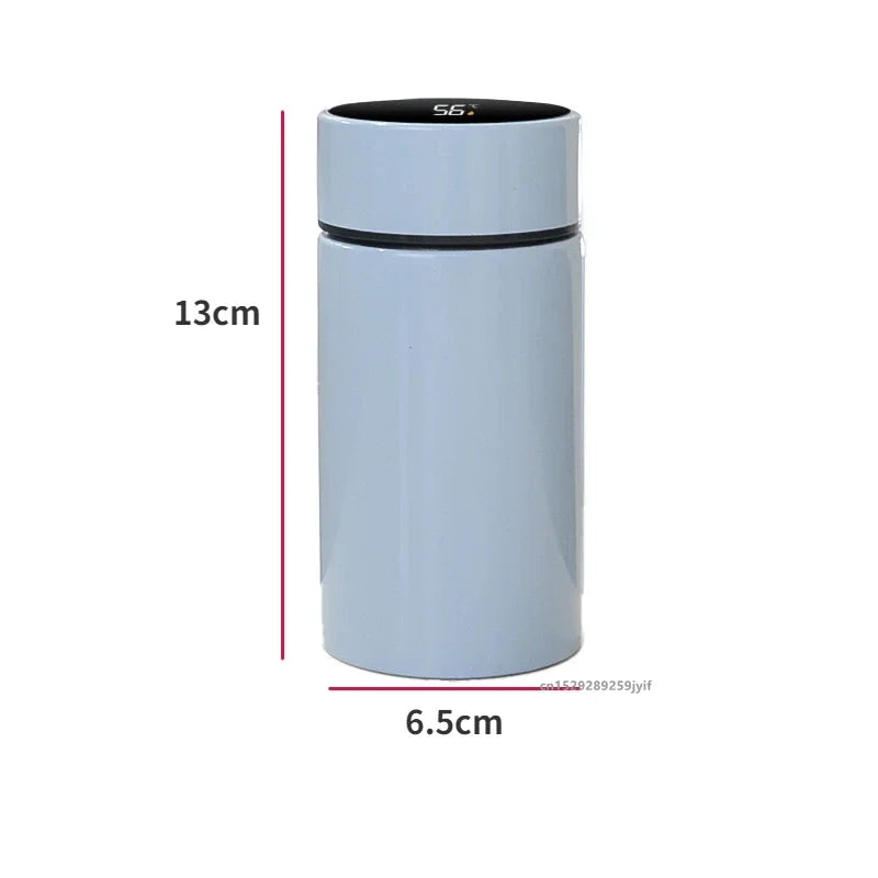 Light blue compact smart thermos, 13cm x 6.5cm, digital temperature display on lid