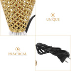 Perforated gold lattice chimney with black plug and power cord