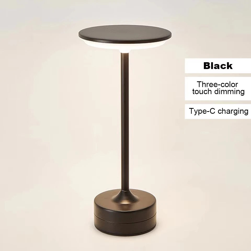 Black cordless reading lamp with touch dimming, round top and wide base