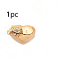 1 pc heart-shaped scented candle favor in a wooden holder with floral tag and wick