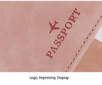 Pink passport folio close-up with embossed “PASSPORT” logo and stitched border
