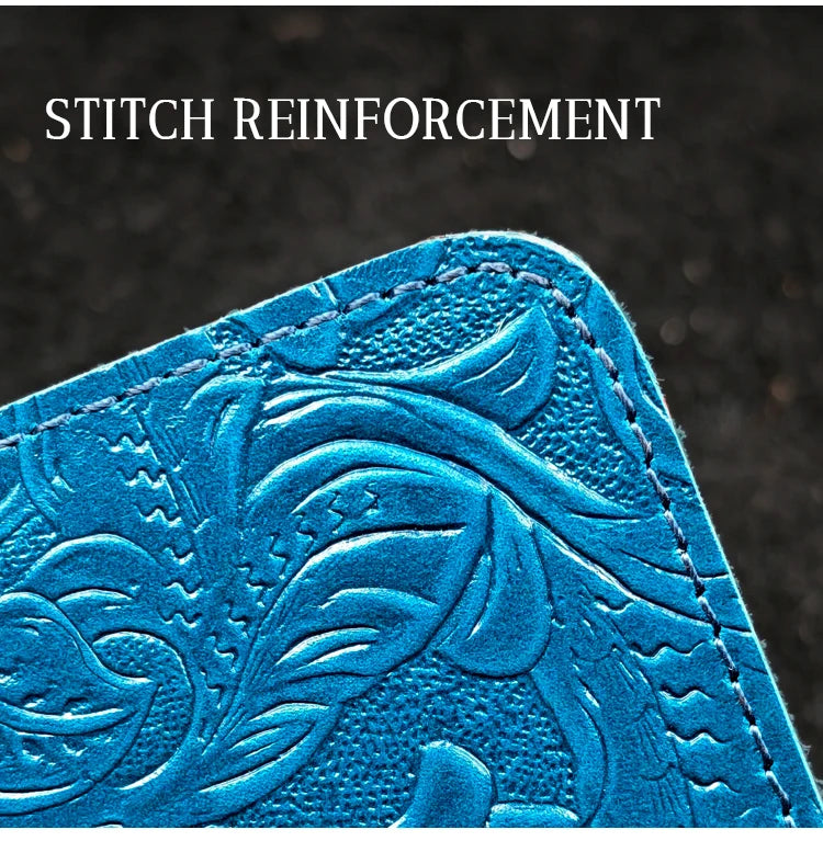 Blue embossed leather folio corner with reinforced stitching detail along the seam.