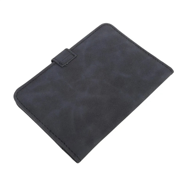 Slate grey passport cover, plain back with stitched edges and small side snap tab