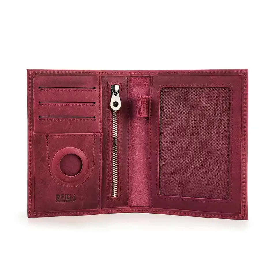 Cardinal red leather passport wallet interior with card slots, zipper pocket, and round AirTag window