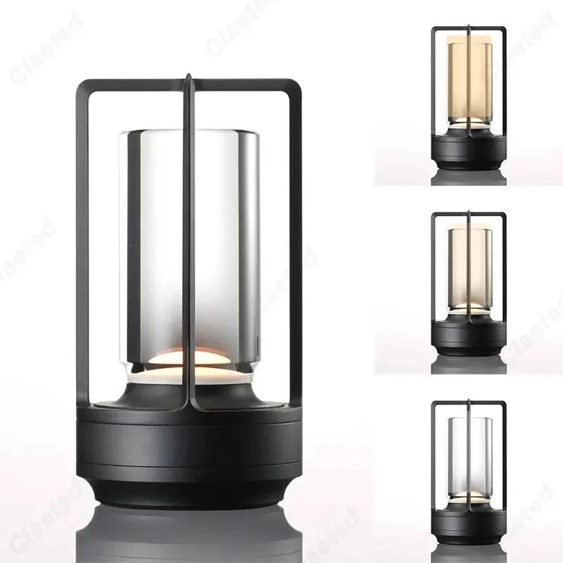 Black lantern-style table lamp with rectangular frame and warm LED glow