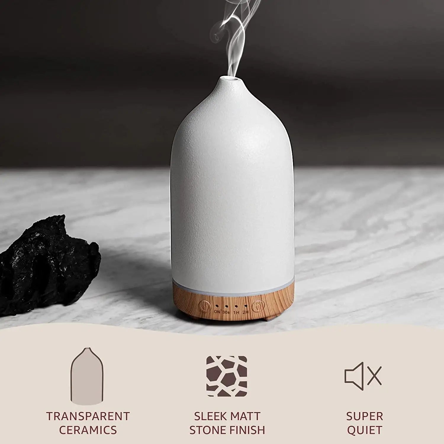 Ivory white ceramic diffuser with sleek matte stone finish and mist nozzle