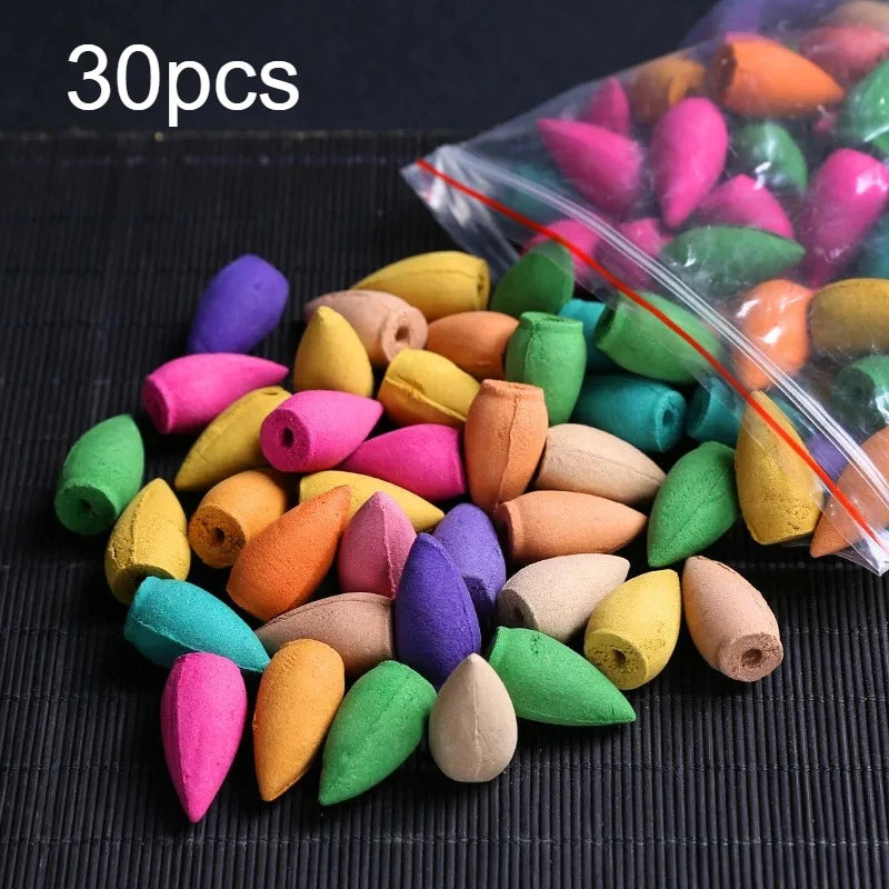 Mixed-color backflow incense cones with a clear bag, including pink, purple, and green
