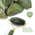 Green jade roller with gold frame and smooth stone head with natural jade pieces