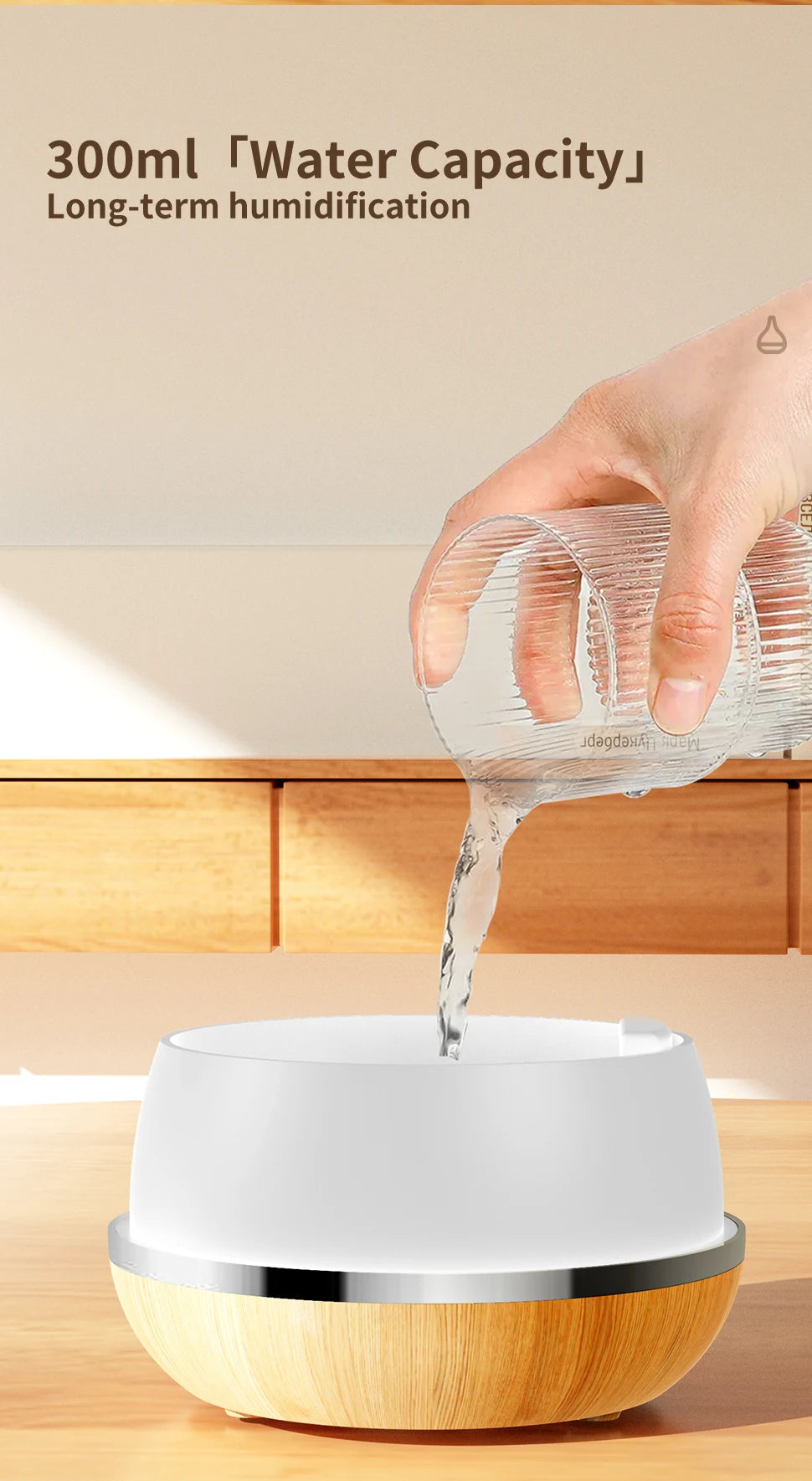 Wood and white aroma diffuser with water being poured into the top opening.