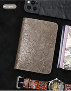 Leather travel folio in slate grey with embossed floral and swirl pattern