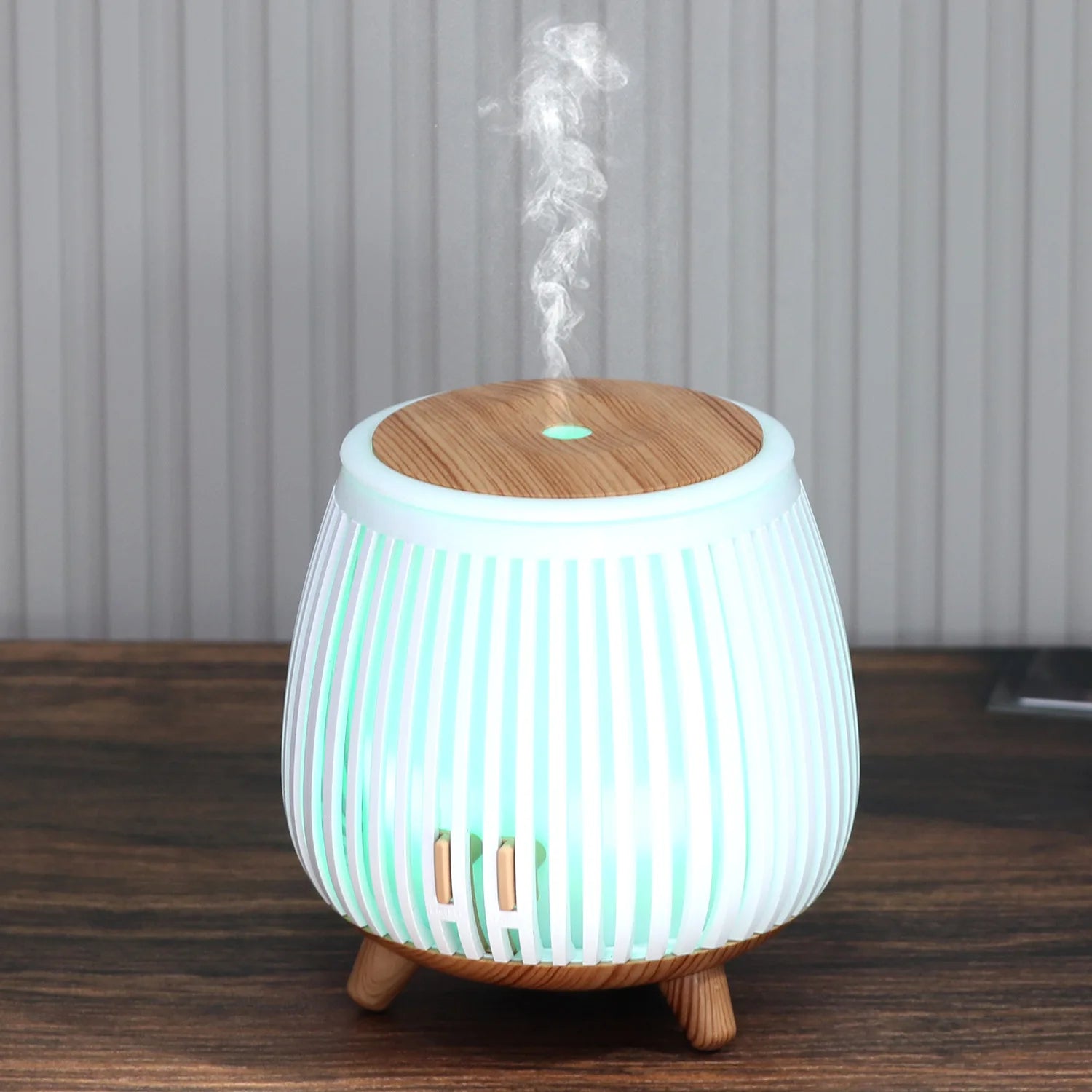 Light wood-grain aroma diffuser humidifier with glowing multicolor LED and mist