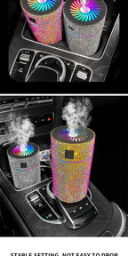 Car aroma diffuser with rainbow rhinestone cylinder and silver cylinder, glowing fan tops