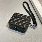 Black quilted leather AirPods case with braided lanyard strap