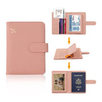 Blush pink passport holder open to show card slots and passport pocket with flap closure