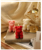 Rose bear scented candle gift set with pink, red, and white bear candles on a tray