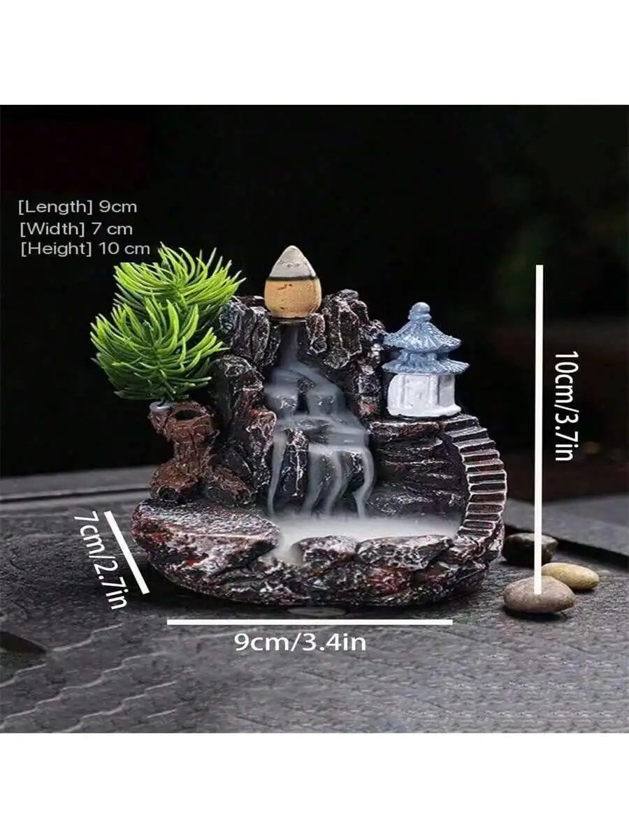 Waterfall backflow incense holder with green plant, lantern, and cascading smoke, size view