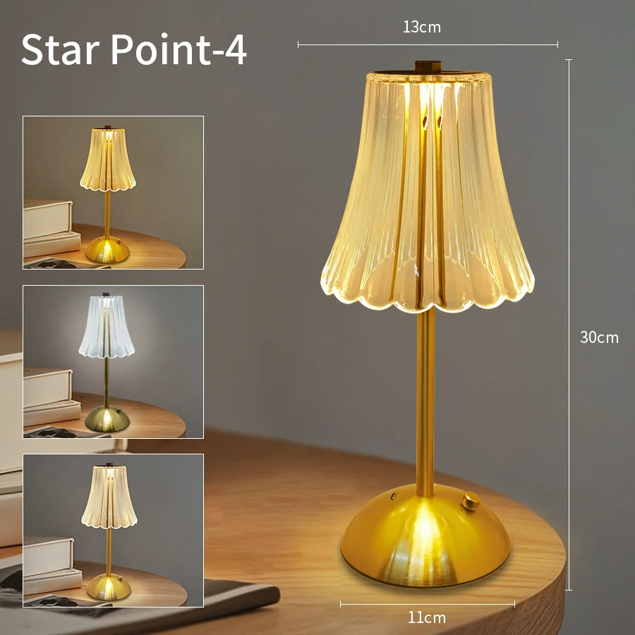 Cordless dimmable night lamp with scalloped bell shade and gold stem, gold base