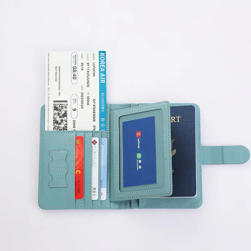 Light blue passport folio opened with card compartments and document holder sections