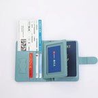 Light blue passport folio opened with card compartments and document holder sections