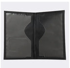 Black passport sleeve interior with two card slots and center pocket panel