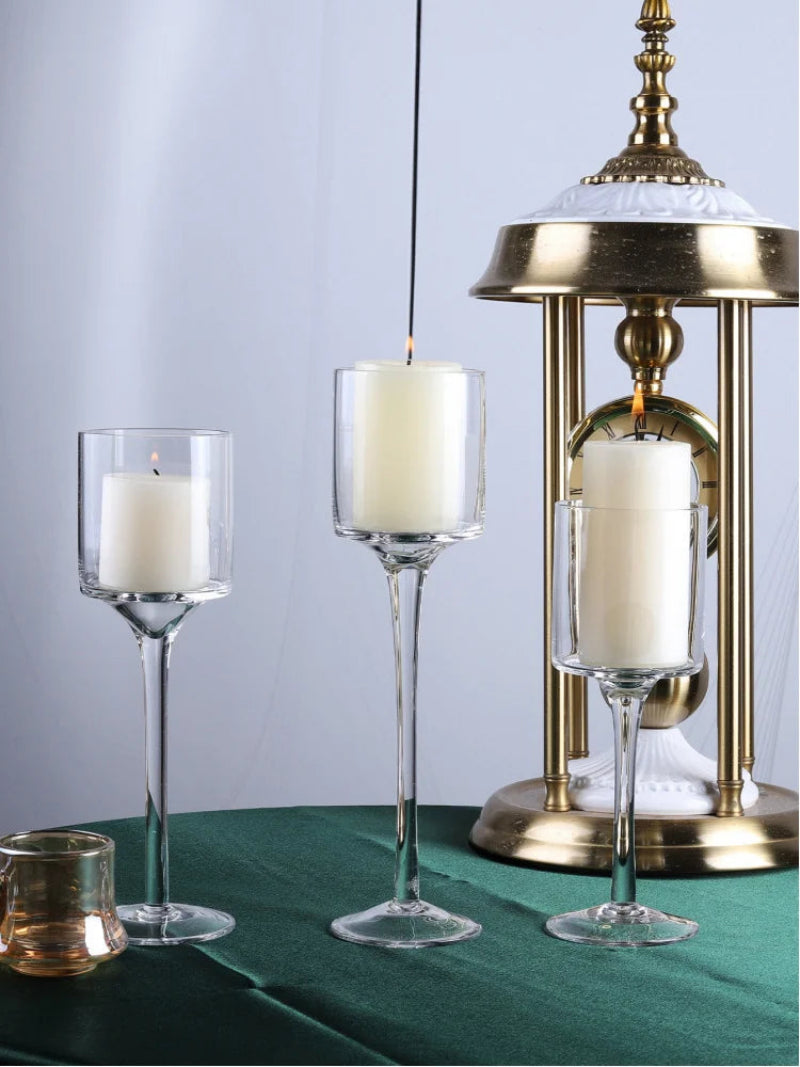 Tall glass candle holder set of 3 with clear cylindrical cups on slender stems