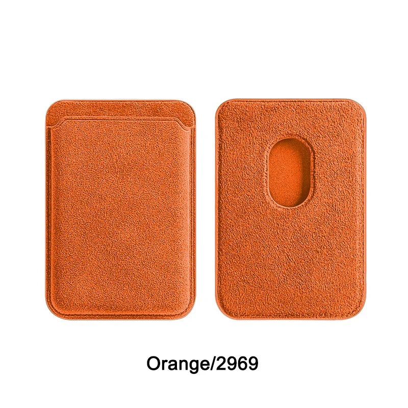 Alcantara MagSafe wallet in orange with oval cutout on back, textured Alcantara.