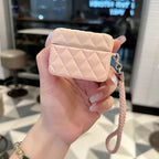 Cream quilted leather AirPods case with lanyard strap and front clasp
