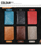 Assorted leather travel folios in blue, black, red, brown, coffee, and grey colors.