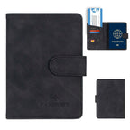 Midnight black RFID passport wallet with fold-over strap and passport icon on front