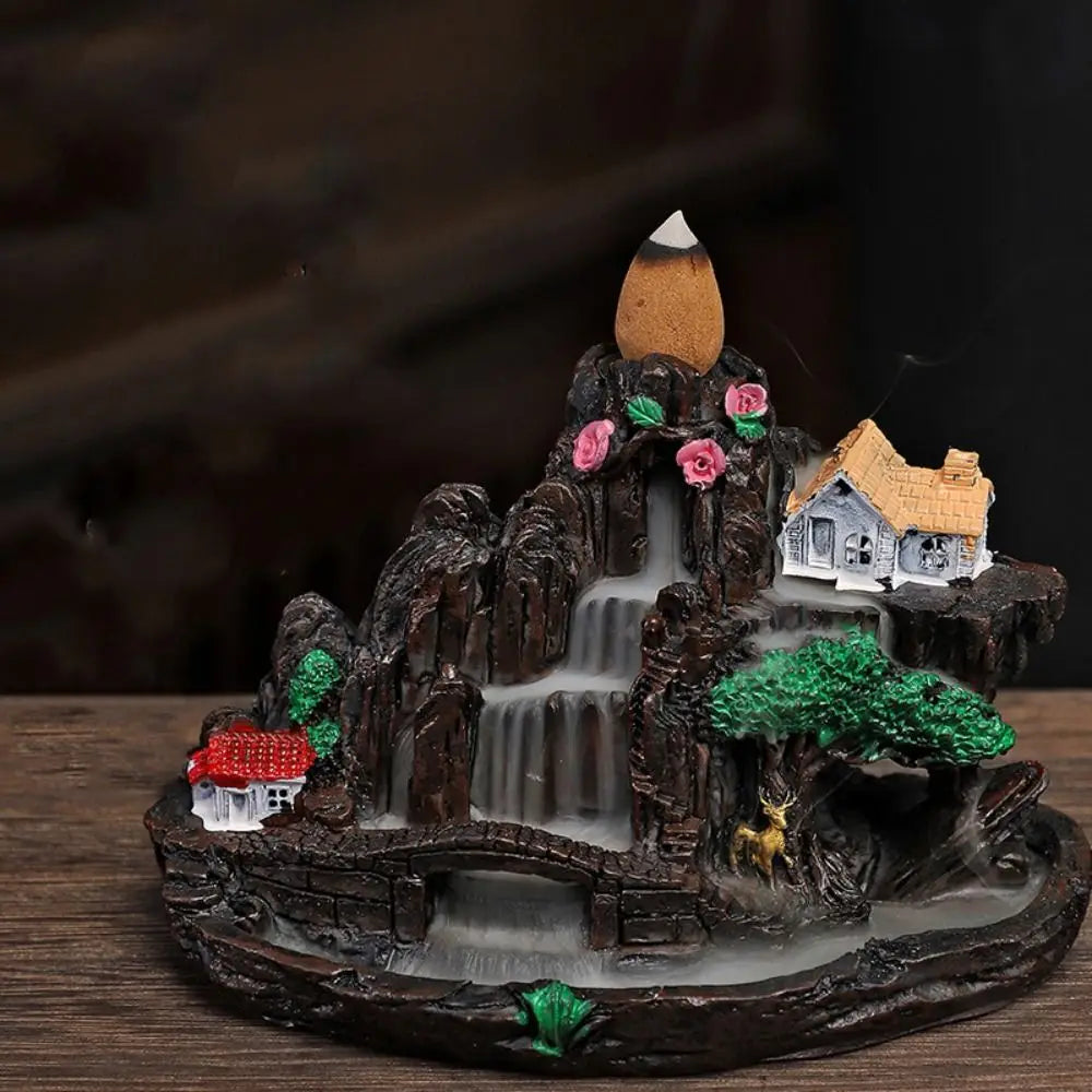 Fairy Mountain backflow incense holder with waterfall scene, cottage, flowers and cone