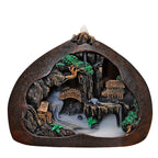 Backflow incense burner with village and bridge scene, smoke pool and green accents