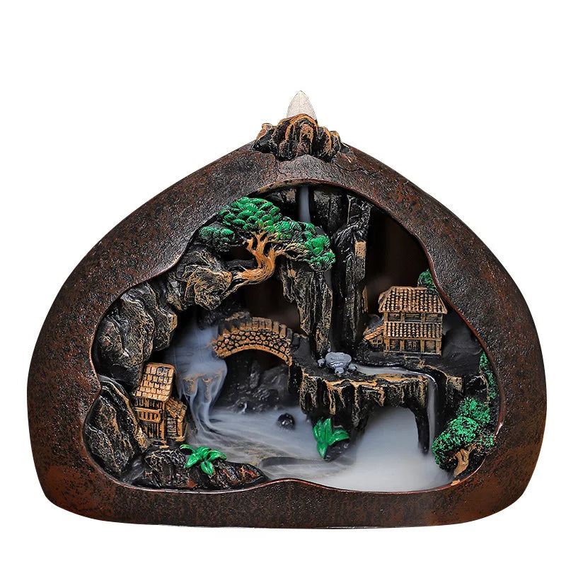 Backflow incense burner with village and bridge scene, smoke pool and green accents