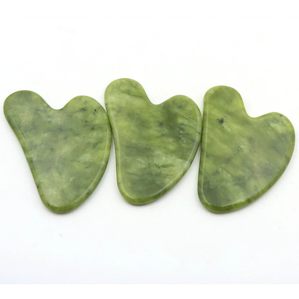 Set of 3 heart-shaped green jade scrapers, smooth curved face