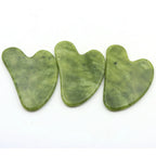 Set of 3 heart-shaped green jade scrapers, smooth curved face
