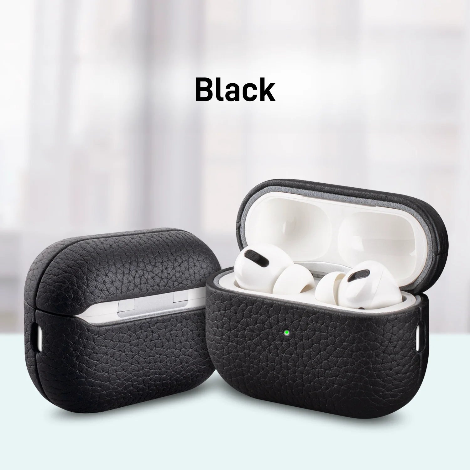 Black MagSafe leather AirPods case with earbuds inside, lid open