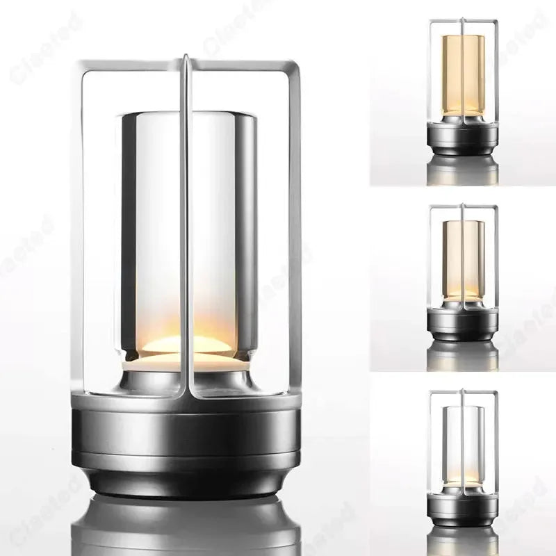 Silver lantern-style table reading lamp with rectangular frame and warm LED glow