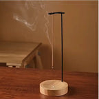 Inverted incense holder with walnut-black base and vertical metal stand