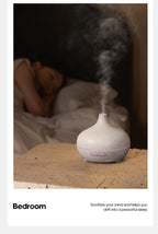 Marble-pattern aroma diffuser with purple LED light and mist
