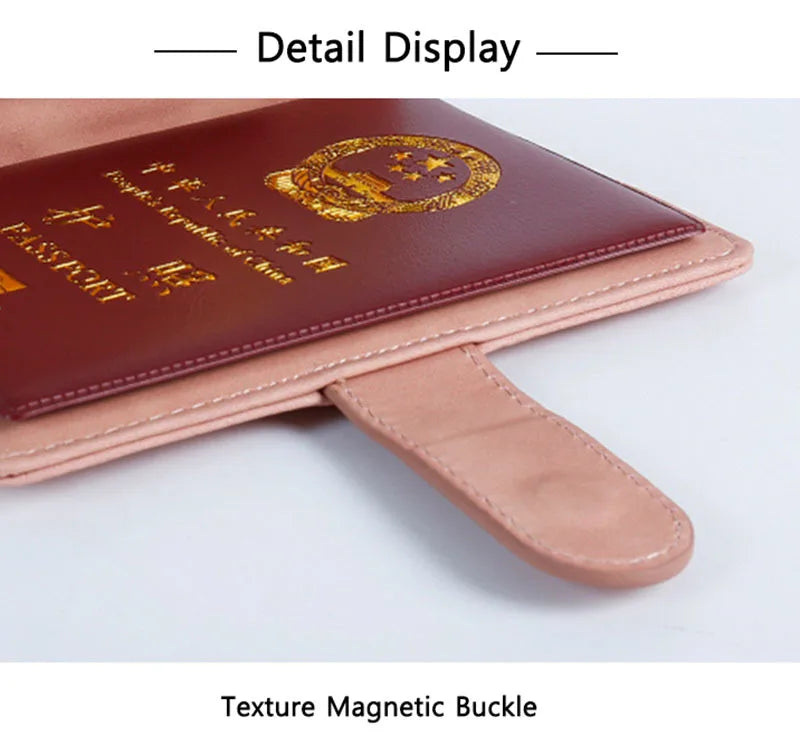 Close-up of passport folio with textured magnetic buckle and luggage tag loop strap