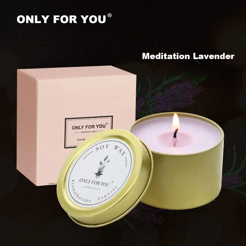 Scented candle in glass jar with lid; “Meditation Lavender” label and lit flame
