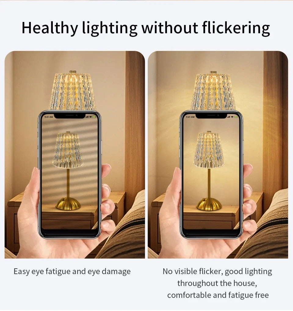 Cordless night lamp with clear pleated shade and brass base shown with smartphone