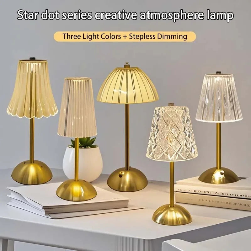 Cordless night lamp set with gold bases and pleated shades in gold and clear
