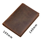 Cognac brown passport wallet with stitched edges and smooth front panel, approx 14x10.5 cm