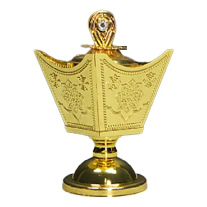 Gold metal incense holder with crown-shaped bowl, engraved motifs, and gem finial lid