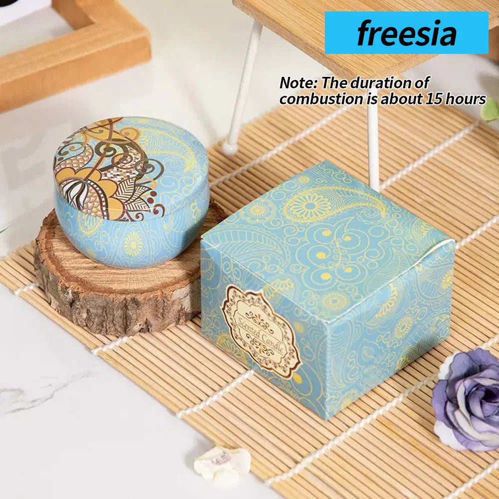 Freesia floral aromatherapy candle, light blue patterned tin with lid