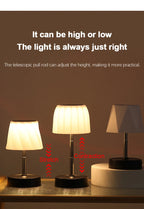 Adjustable-height cordless LED lamp with pleated white shade and black base