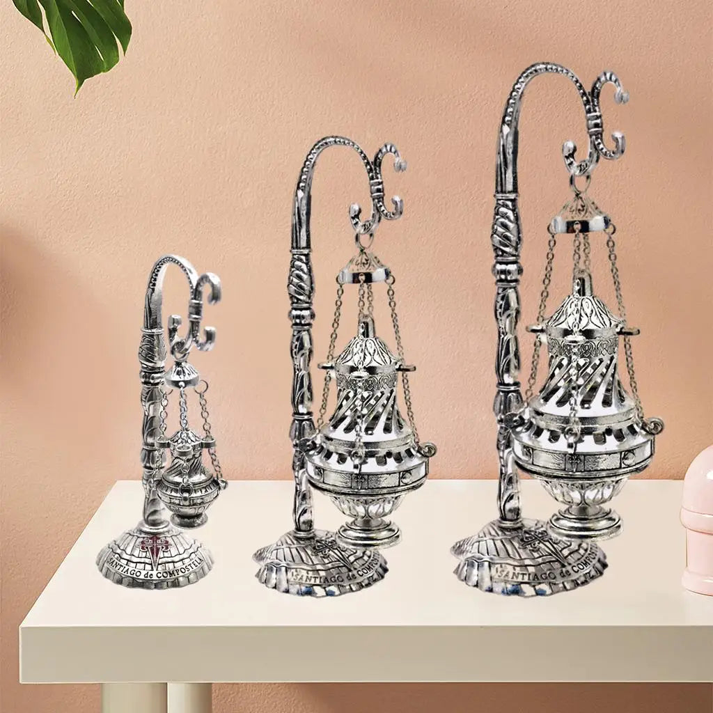 Metal censer with ash catcher and hanging chain ornament, arched nozzle tubes