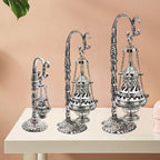 Metal censer with ash catcher and hanging chain ornament, arched nozzle tubes